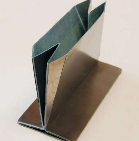 Origami solution found for folding steel shopping bags