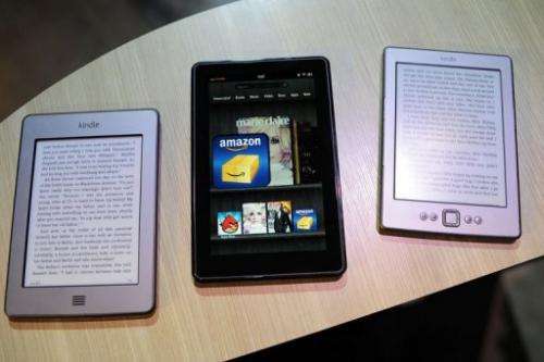 New Amazon Kindle products Kindle Touch (L), Kindle Fire tablet (C) and new Kindle