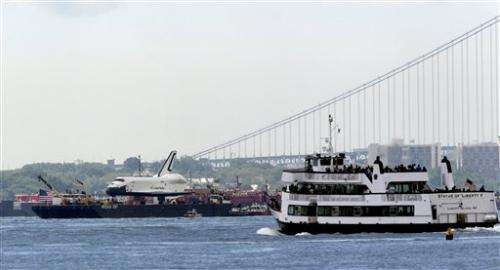 Space shuttle Enterprise floats to Manhattan home