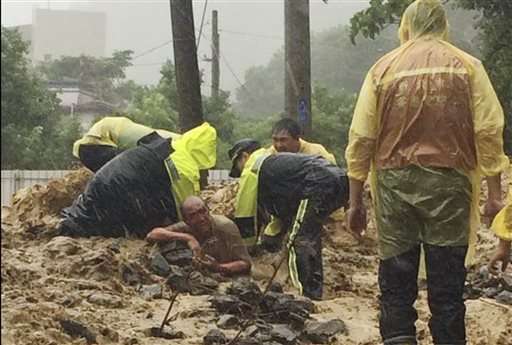 Typhoon weakens over China after leaving 22 dead, missing