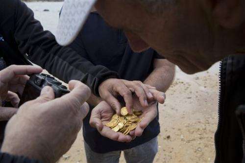 Israel unveils its largest find of medieval gold coins