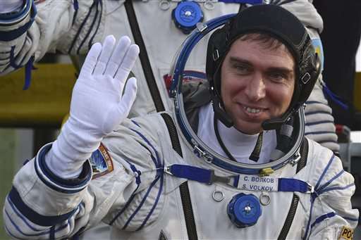 Soyuz carrying 3-man crew blasts off for orbiting station