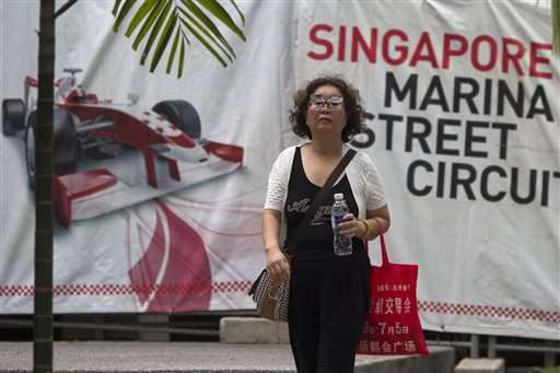 Singapore schools, F1 race on edge as bad haze persists (Update)