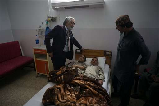 Pakistan treating 2 brothers who become paralyzed each night