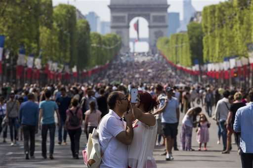 Pedestrians take over Champs-Elysees as Paris goes green