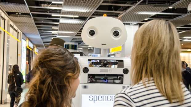 Robot spencer accompanies first passengers at Schiphol airport