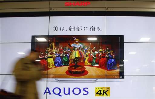 Japan's Sharp accepts takeover, Foxconn not ready to sign