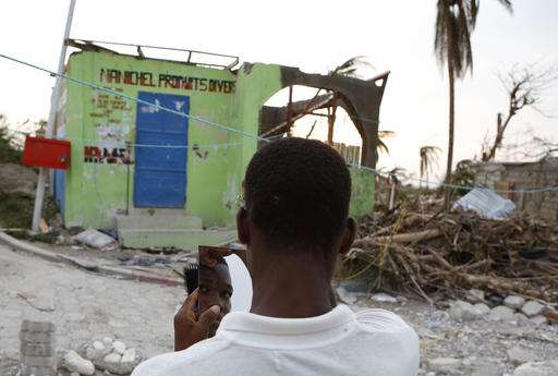Aid arrives in Haiti, but desperation grows in cut-off towns