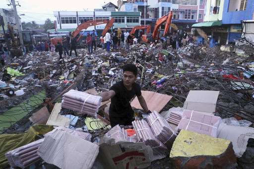 Aid groups descend on Indonesia quake zone; deaths reach 102