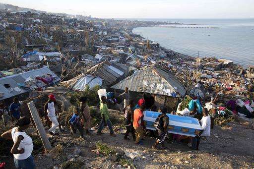 Hurricane creates new crisis in Haiti, aid begins arriving