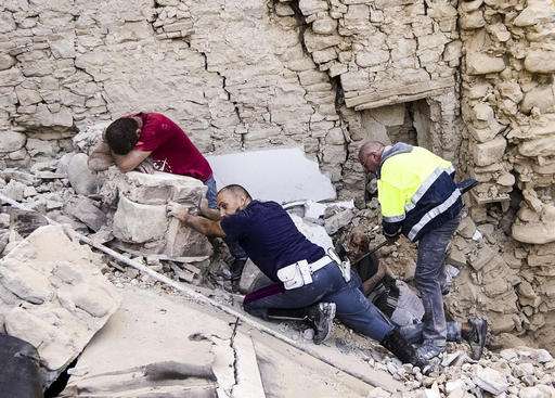 Rescuers search for survivors in Italy quake that killed 247