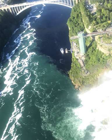Discharge turns water at base of Niagara Falls black