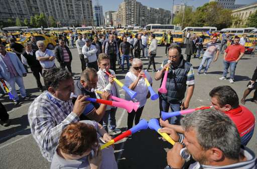 Romania: hundreds of taxis, buses protest against Uber