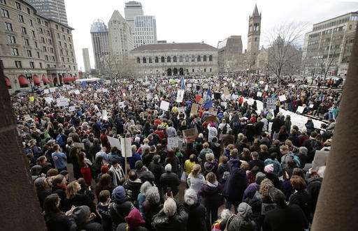 Scientists hold rally in Boston protest threats to science