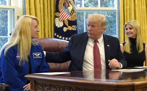 Astronaut breaks US space record, gets call from Trump (Update)