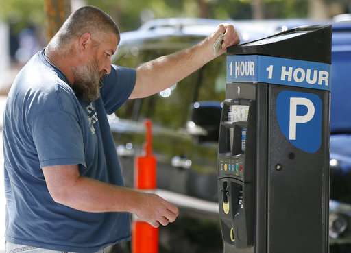 Oklahoma City, where parking meters began, modernizes system
