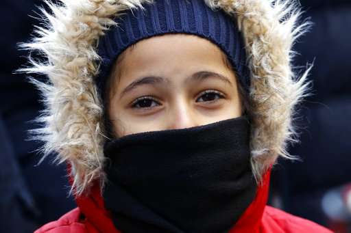 Bundle up: Bitter cold weather takes hold of northern US