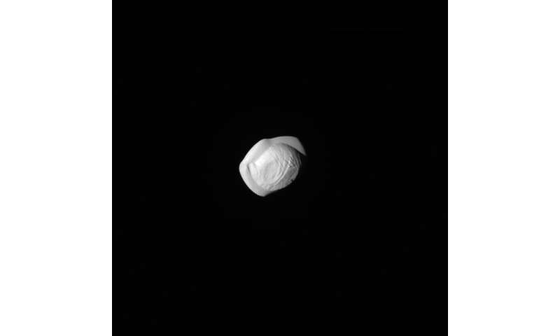 Cassini reveals strange shape of Saturn's moon Pan