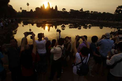 Archaeologists at Angkor Wat find large buried statue