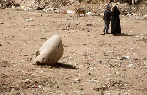 Archeologists in Egypt discover massive statue in Cairo slum