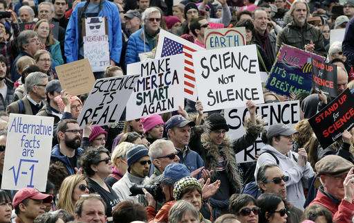 Scientists hold rally in Boston protest threats to science