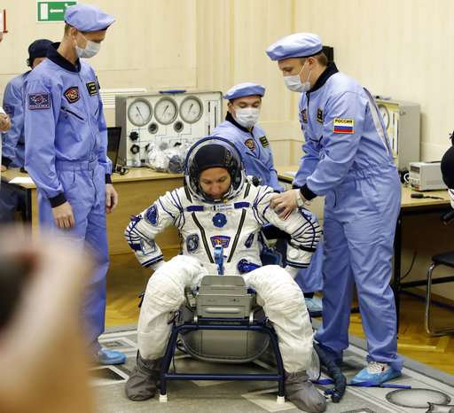 Space capsule with 3 astronauts blasts off to orbiting lab