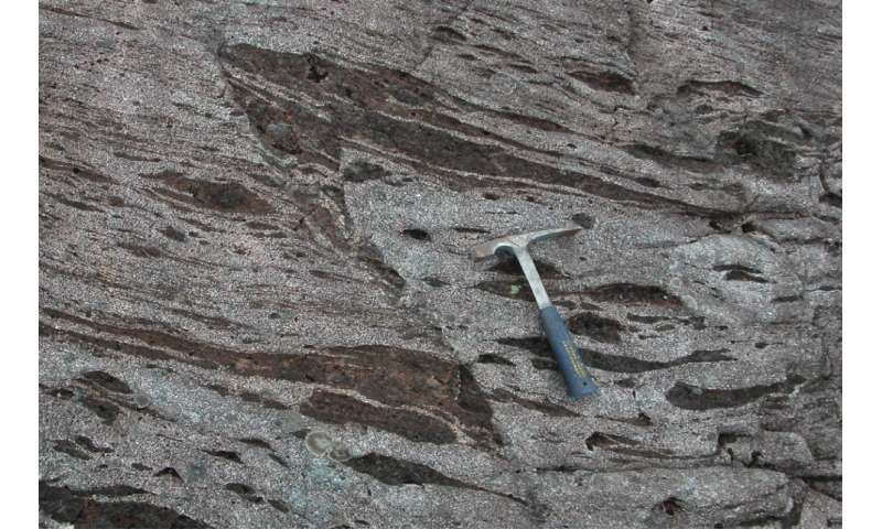 Garnet crystal microstructures formed during ancient earthquake provide evidence for seismic slip rates along a fault