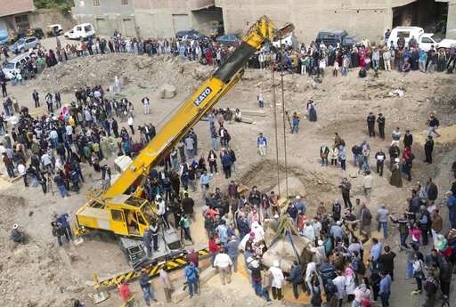 Second part of ancient Egyptian statue lifted from site