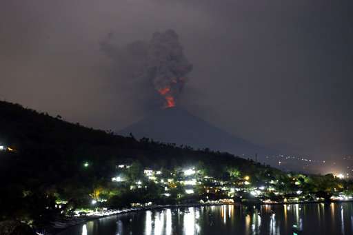 Bali volcano spits ash 2 ½ miles in the sky, airport closed