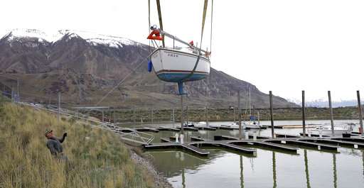 Boats left high and dry by drought back on Great Salt Lake