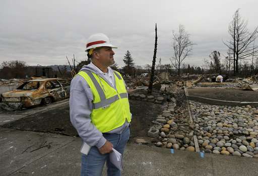 Clearing ruins launches new phase in California fire cleanup
