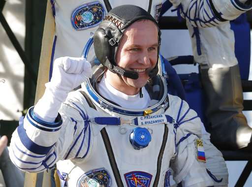 Space capsule with 3 astronauts blasts off to orbiting lab