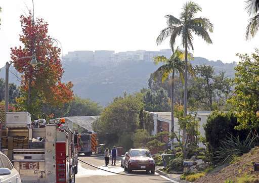 Forecast of higher winds could complicate wildfire fight