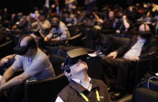 The Latest at CES: Companies up 'wow' factor to stand out