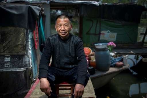 Many river-dwellers say they cannot affort to live elsewhere in Shanghai