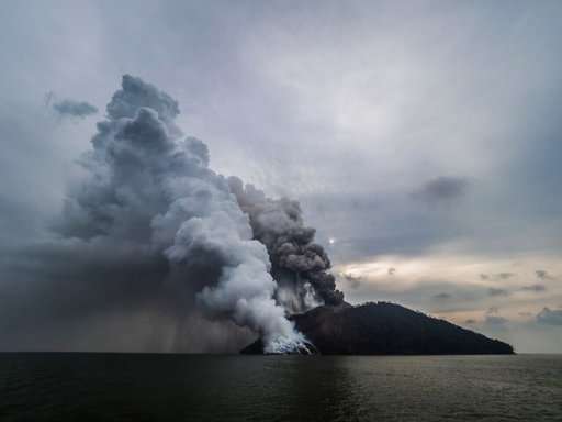 Island volcano in Papua New Guinea erupts with ash, steam