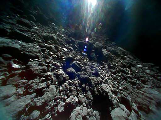 Photos from Japanese space rovers show asteroid is ... rocky