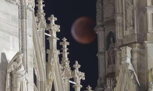 World gazes at total lunar eclipse, longest of this century