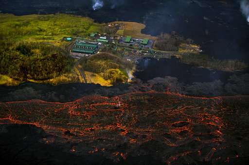 Hawaii volcano unleashes more small blasts, snaking lava