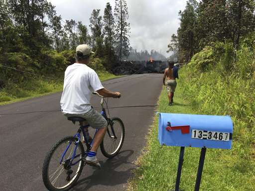 Lava flowing from Hawaii's Kilauea volcano destroys 9 homes