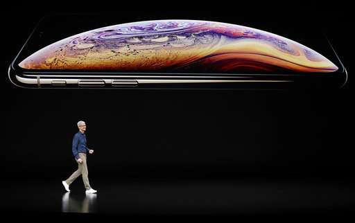 The Latest: Apple ups ante on larger iPhone screens