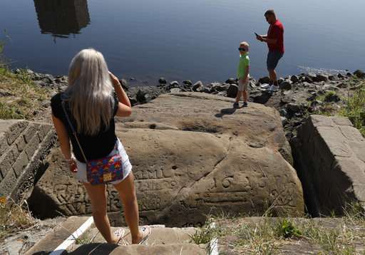 Drought reveals ancient 'hunger stones' in European river