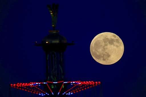 World gazes at total lunar eclipse, longest of this century
