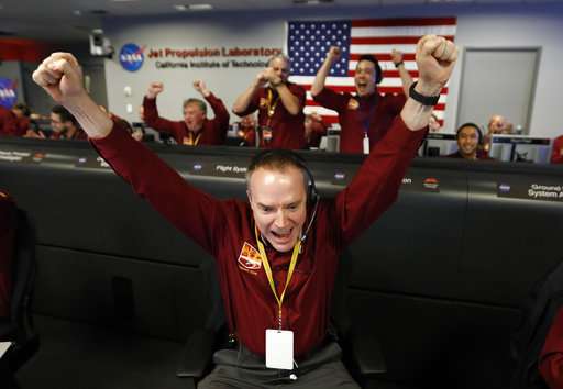 'Flawless': NASA craft lands on Mars after perilous journey