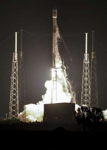 SpaceX launches communication satellite, ditches old booster