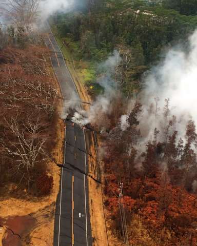 Light coats of gritty ash fall near erupting Hawaii volcano