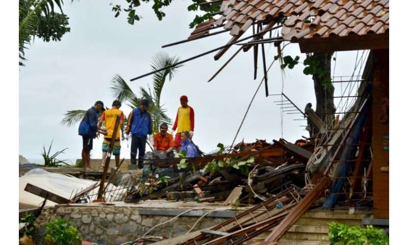 Hundreds of buildings were destroyed by the wave, which hit the coast of southern Sumatra and the western tip of Java Saturday n