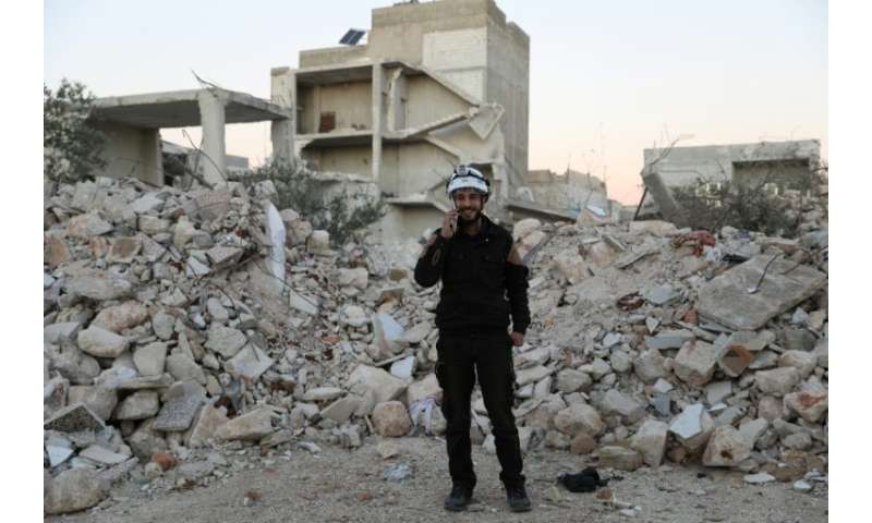 Mohammed Hamroush, a member of the &quot;White Helmets&quot; in Syria uses an app on his smartphone to track bombardments