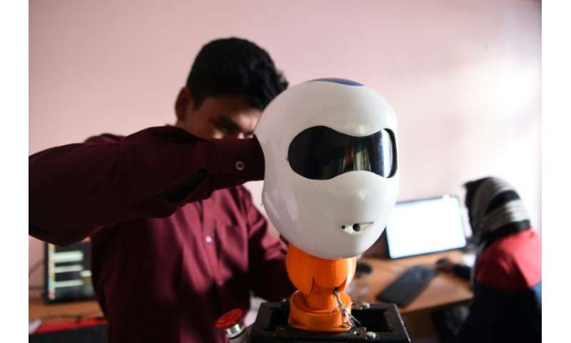 The team of 25 young engineers worked for months to build the robot, welding and moulding the prototype by hand in their tiny th