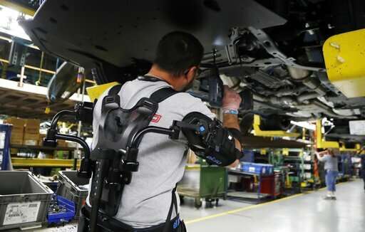 Companies hope vests will ease burden for assembly workers